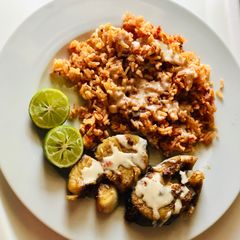 A picture of Grilled king fish & tomato rice.