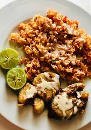 A picture of Grilled king fish & tomato rice.