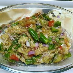 A picture of Begun Pora(Eggplant Roast).