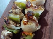 Una foto de pinchos de cerdo