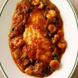 Merluza guisada con gambas y verduras