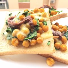 A picture of Chickpea And Spinach With Mozzarella Cheese And Anchovies.