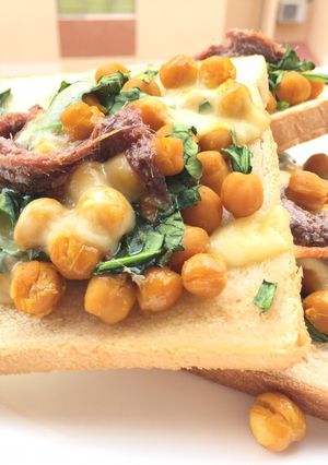 A picture of Chickpea And Spinach With Mozzarella Cheese And Anchovies.