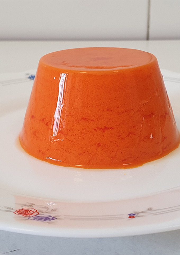 Una foto de Gelatina de yogur y naranja