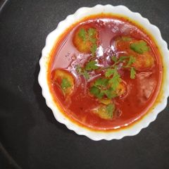 A picture of Tomato Potato Curry.