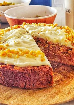 A picture of Carrot cake with cream cheese frosting.