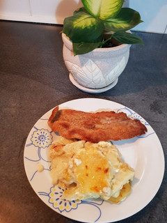 Una foto de Papas a la crema gratinadas !!!🥔🥛