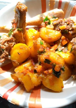 A picture of Guinea fowl and potato pot roast.