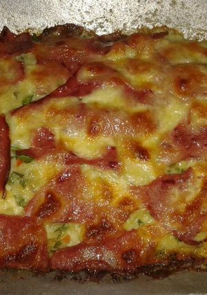 Una foto de Tarta de sobra de arroz con verduras jamón y queso mozzarella