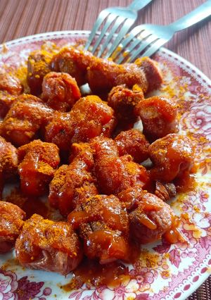 Una foto de Currywurst