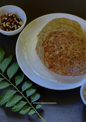 A picture of Moong Sprouts Dosa with Coconut Chutney.