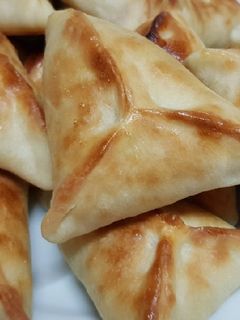 صورة لوصفة فطاير السبانخ المثلثة 🥐🌿