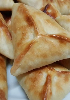 صورة لوصفة فطاير السبانخ المثلثة 🥐🌿
