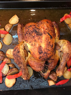 Una foto de Pollo al horno con hierbas provenzales