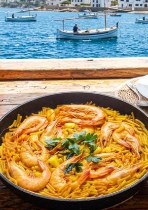A picture of Fideuá with Squid and Shrimp with Dill Aioli.