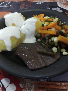 Una foto de Papas con Salsa de Queso