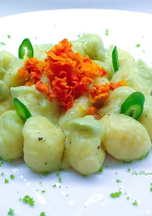 A picture of Gnocchi with Romanesco Broccoli Cream and Carrot Chips.