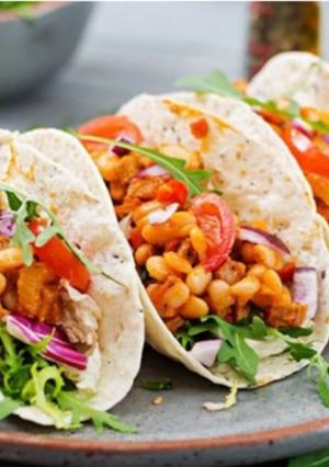 Una foto de Tacos de Pollo a Sabor a Naranja