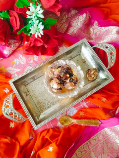 A picture of ALMOND KHAJOOR LADDU 😋.