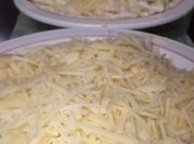 Una foto de ravioli con bechamel