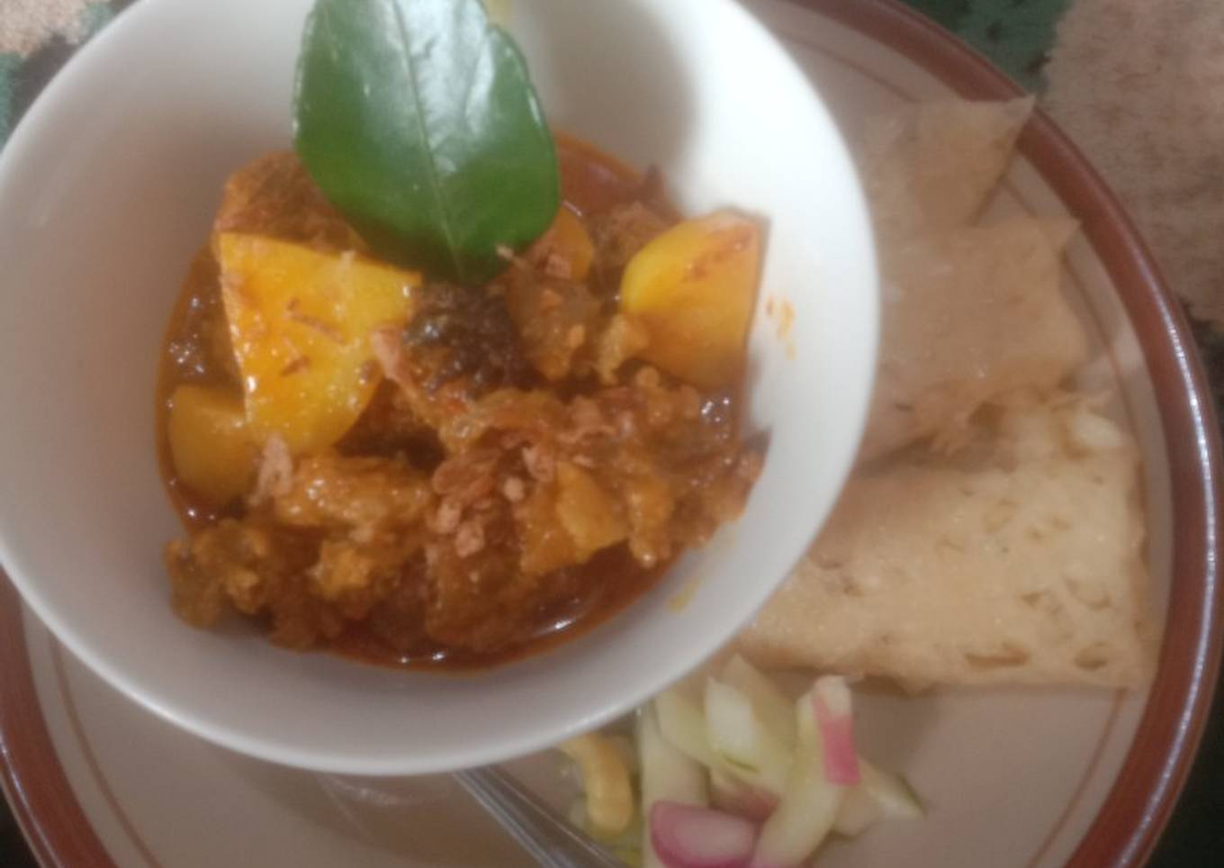 Kari kambing dan roti jala