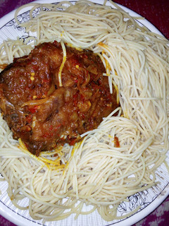 A picture of Spaghetti with sauce.