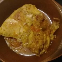 A picture of Pot fry chicken in gravy.