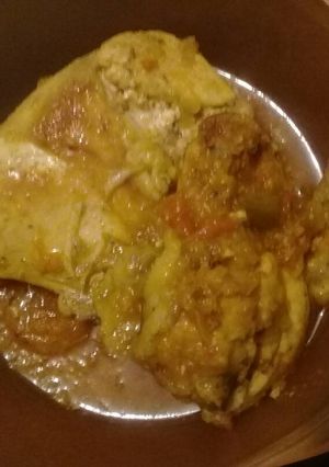 A picture of Pot fry chicken in gravy.