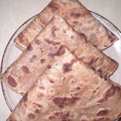 A picture of Brown chapatis.