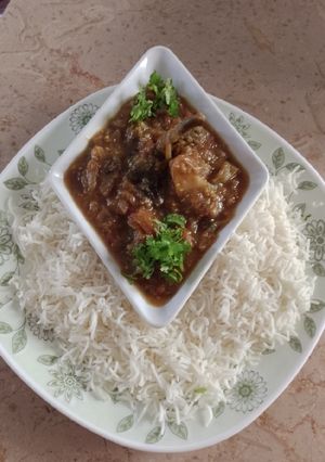 A picture of Brinjal (egg plant) Bharta with Rice.
