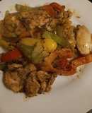 Tandoori marinated chicken thighs with mixed peppers and onion
