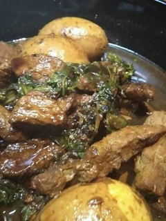 A picture of Pork and fried tofu (adobong baboy na may tokwa).