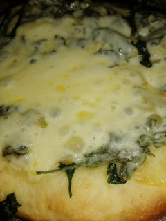 Una foto de Pizzeta Piedra de espinaca
