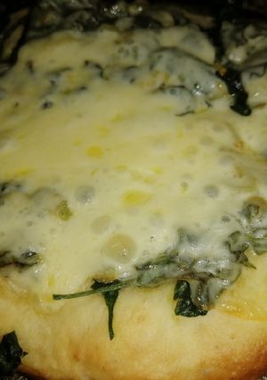 Una foto de Pizzeta Piedra de espinaca