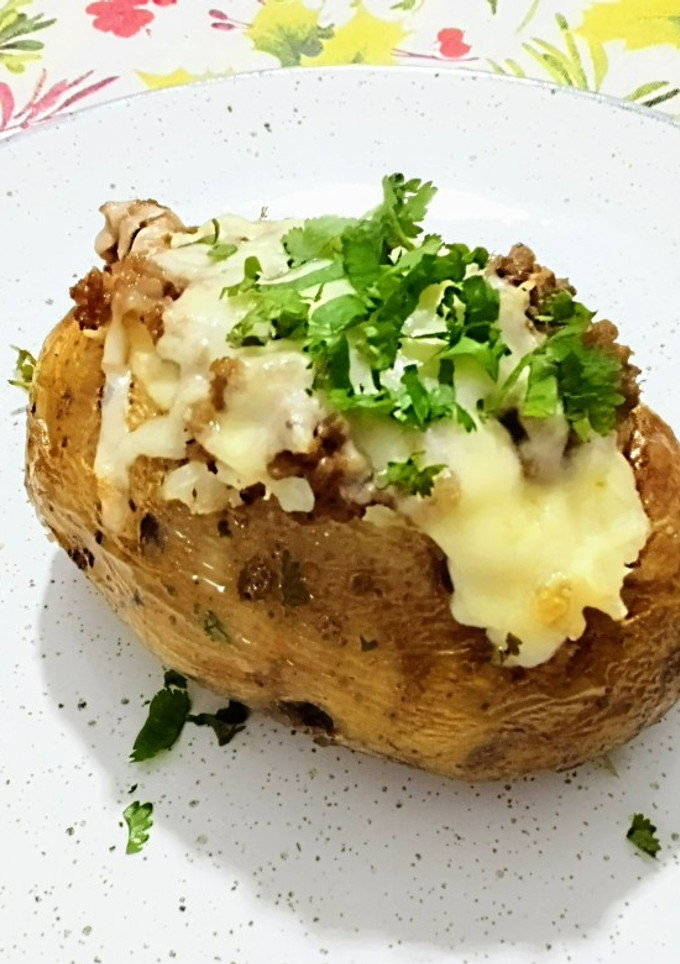 Una foto de Papas rellenas al horno/fondue de papa
