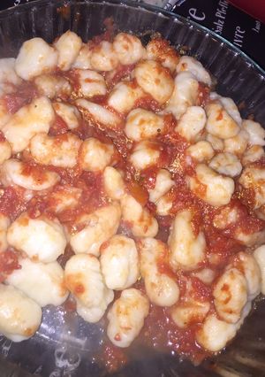 Una foto de Ñoquis de papa con salsa de tomate