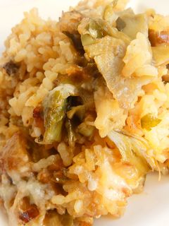 Una foto de Arroz gratinado con boletus y alcachofas