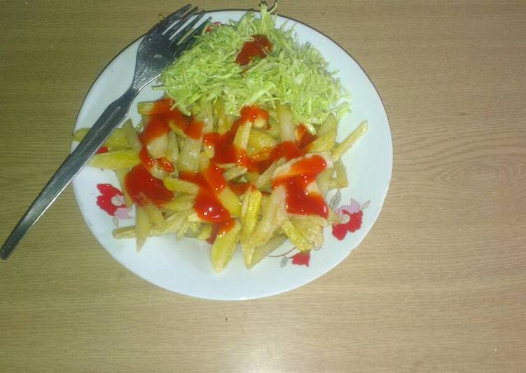 Fried potatoes with avocado cabbage salad