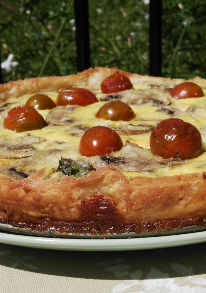 Una foto de Quiche de espinacas y champiñones