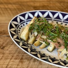 A picture of 🍆 Steamed aubergine, seasonal garnish, Japanese citrus soysauce.