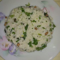A picture of Curd poha (flattened rice).