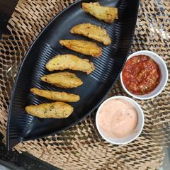 A picture of Potato Wedges.