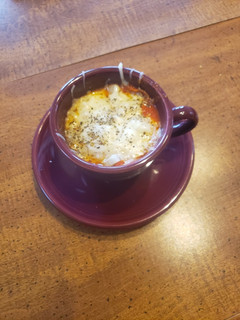A picture of Pizza in a Cup.