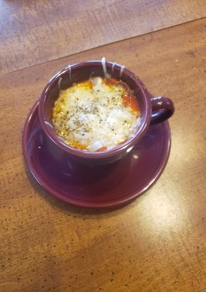 A picture of Pizza in a Cup.