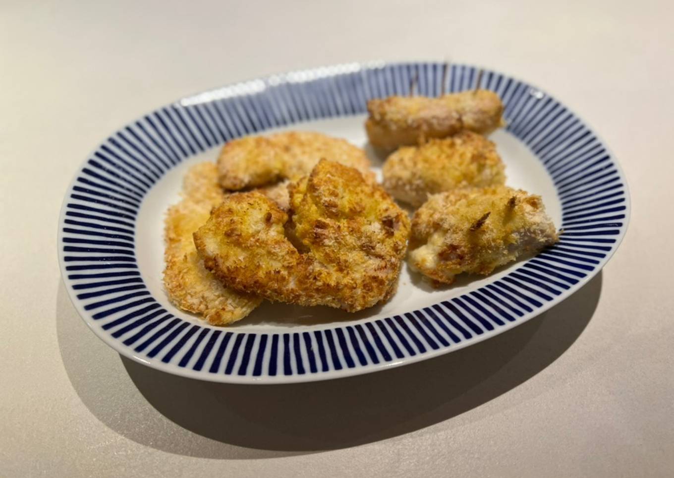Pechugas de pavo empanadas en freidora de aire (2 versiones)
