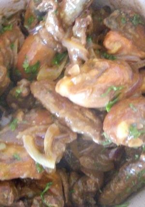 A picture of Roast chicken in orange jus.