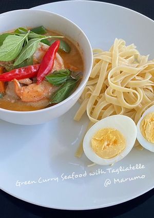 A picture of Green Curry Seafood with Tagliatelle.