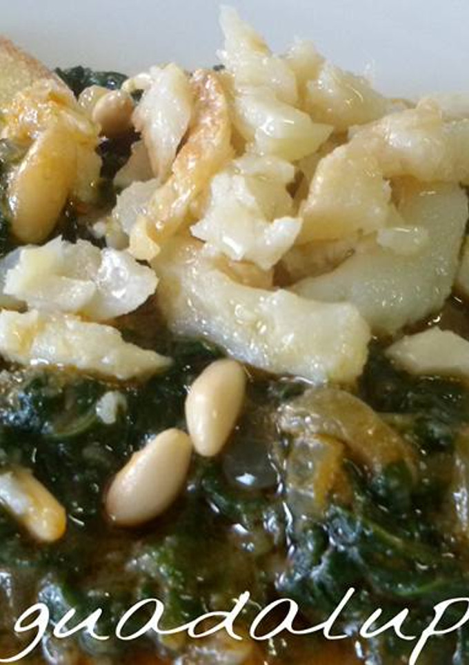 Una foto de Espinacas con pasas y piñones y bacalao al ajillo en gme y tradicional
