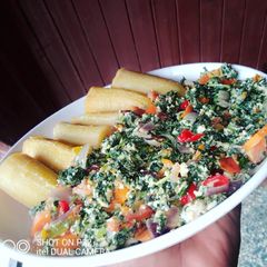 A picture of Boiled plantain and vegetable egg sauce.