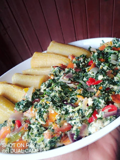 A picture of Boiled plantain and vegetable egg sauce.